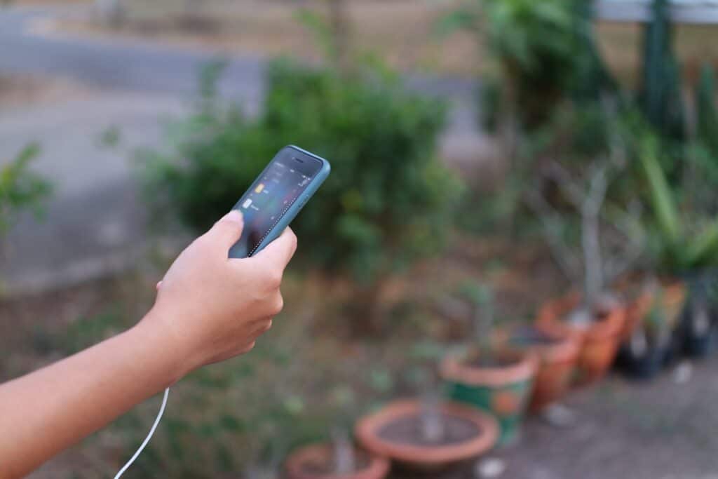 Smart irrigation systems in Montgomery County, TX can be controlled from a mobile device like this.